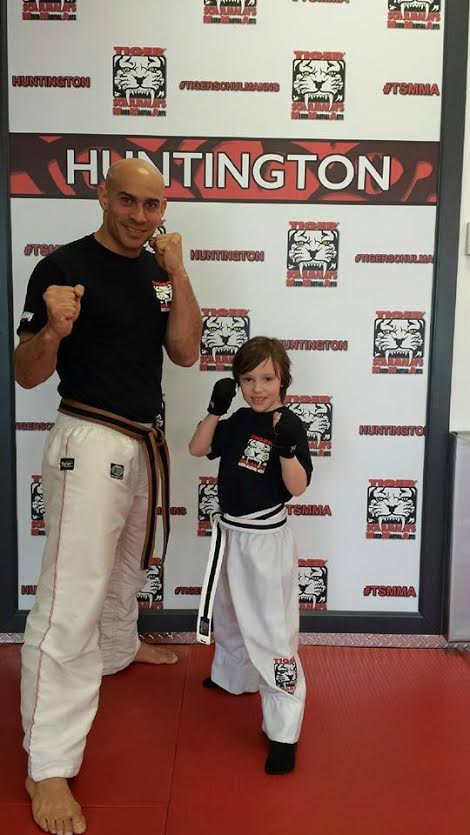 MMA Sensei and a boy in Tiger Schullman's in Huntington