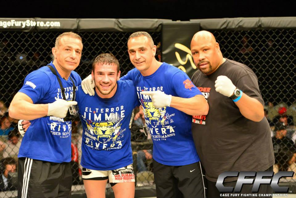 Four Tiger Schulmann's fighters with Printed Shirts in the Octagon Ring