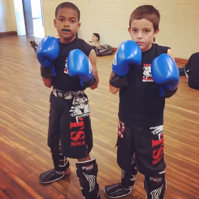 Two Boys with Blue Gloves at Tiger Schulmann's gym