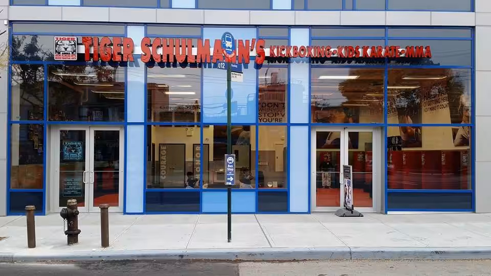 Tiger Schulmann's Martial Arts red sign on a Facade