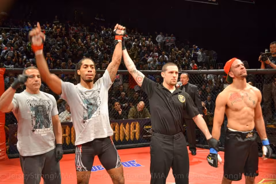 Tiger Schulmann's fighter Declared as Winner in ring with the crowd behind