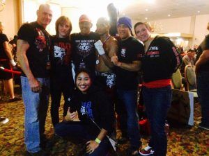 Gerry DeJesus with Shihan Simpson (far left) and Sensei Villafane (3rd from left) with the victory pose.