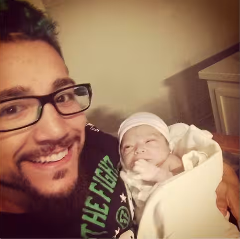 MMA fighter with his Newborn Baby