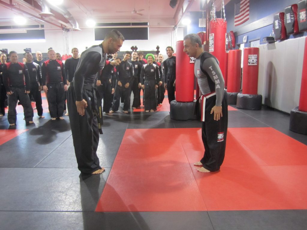 Two MMA Men Bowing at Tiger Schulmann's gym