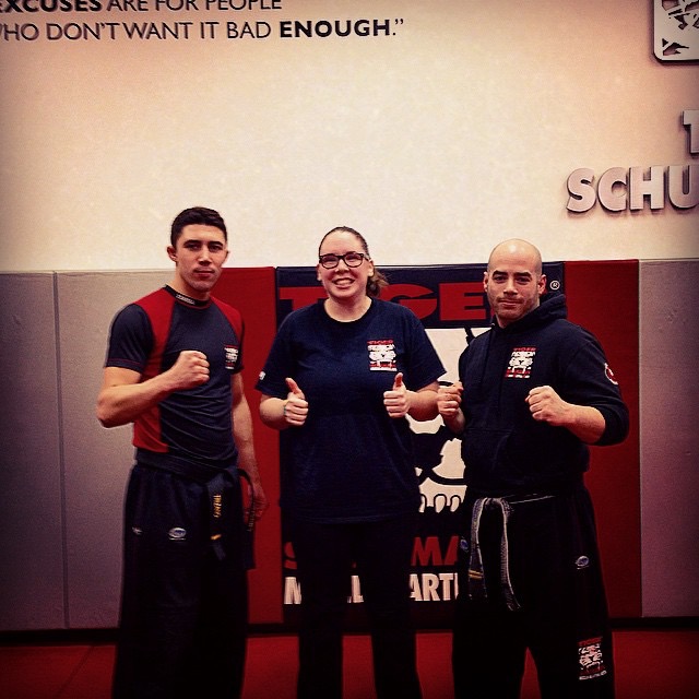 Tiger Schulmann's Martial Arts | Woman Thumbs Up Group Photo
