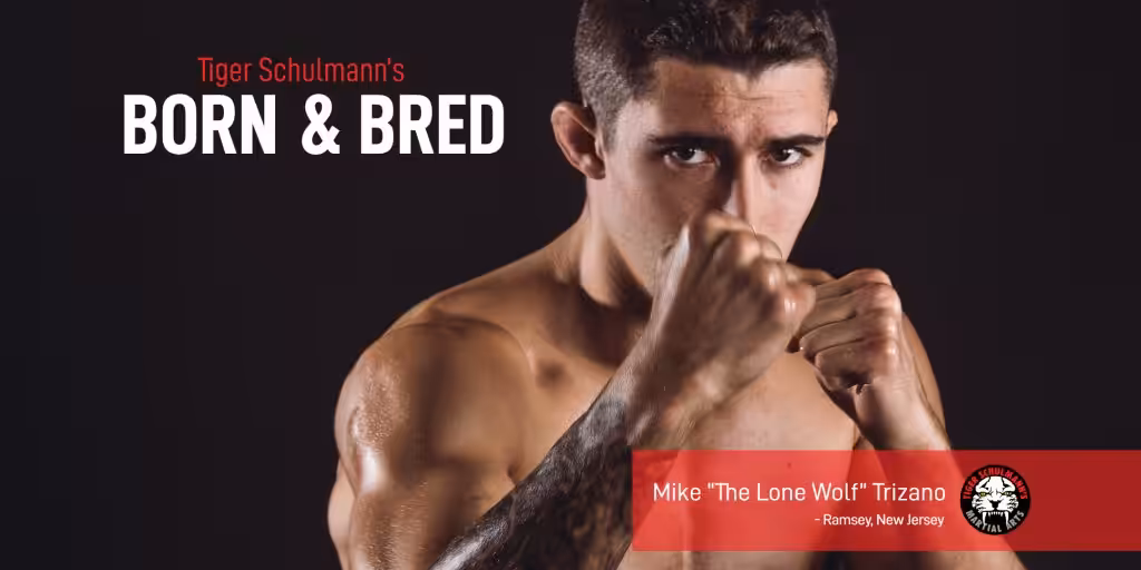 Tiger Schulmann's MMA fighter Mike Trizano with fists up