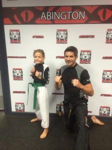 Traditional Karate belt system still helps MMA students see build confidence through achievement.