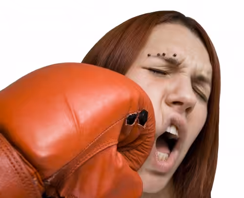 A woman gets punched in the face by the red glove