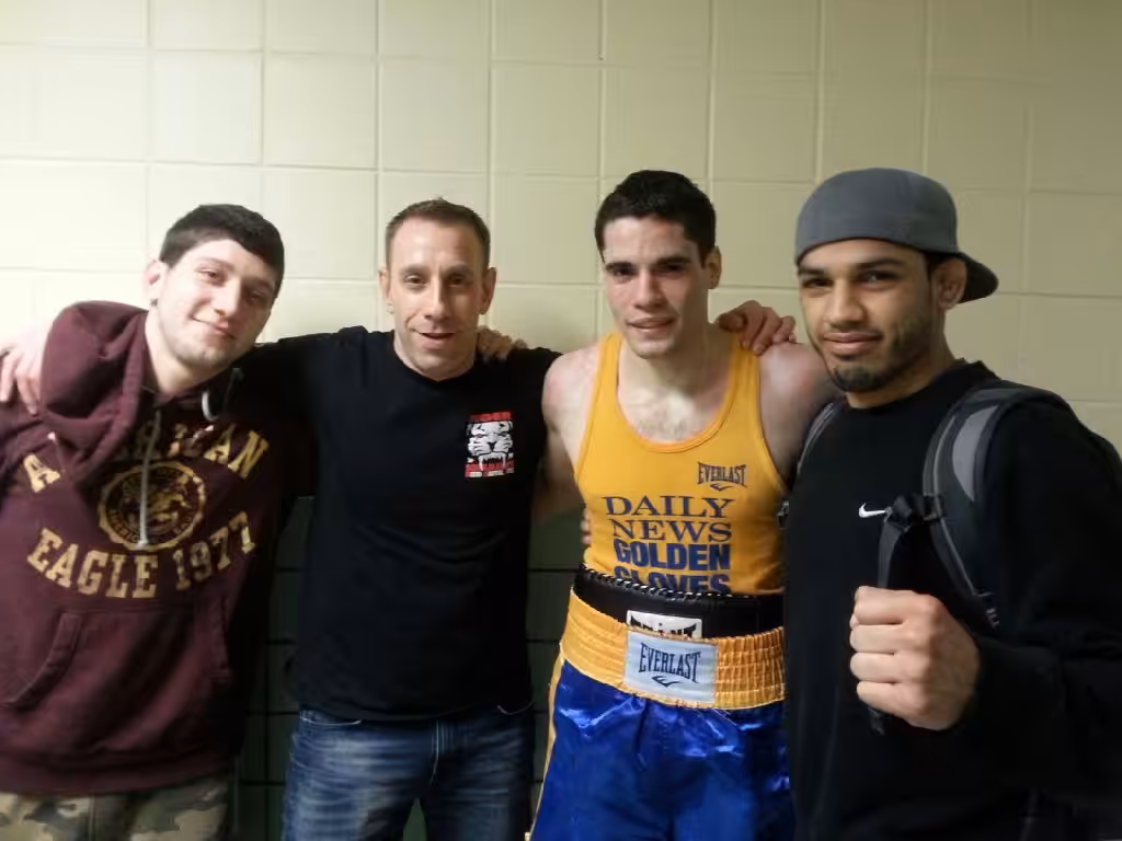 Four Tiger Schulmann's Martial Arts fighters in TSMA apparel
