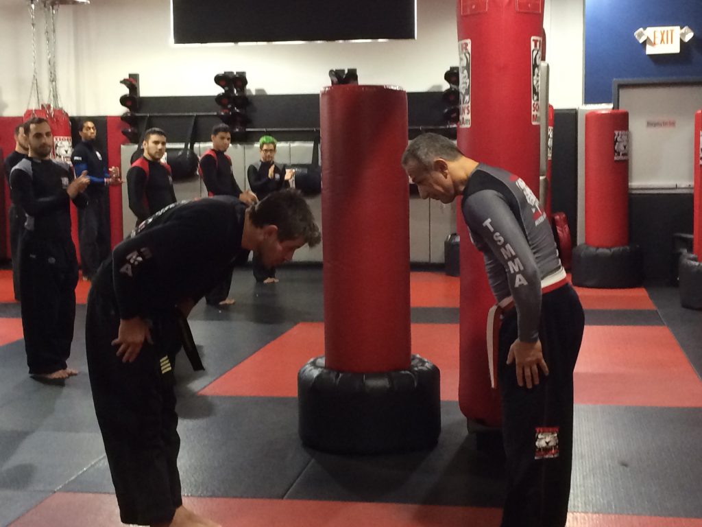 MMA fighters Bowing Down during workout at Tiger Schulmann's