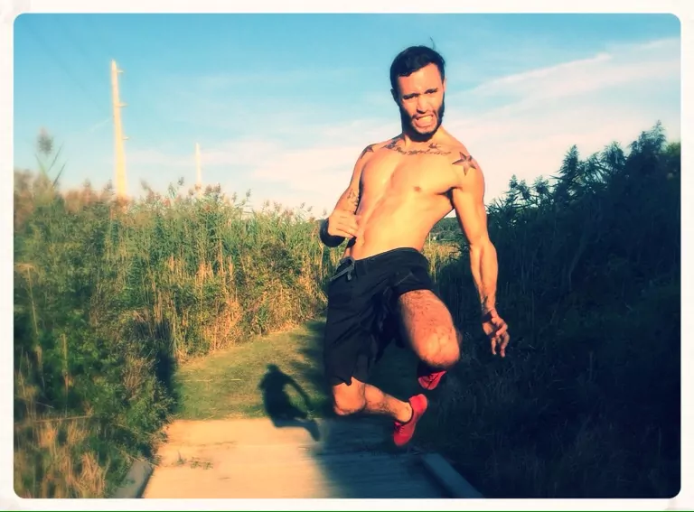 Tiger Schulmann's MMA fighter Jumping in nature