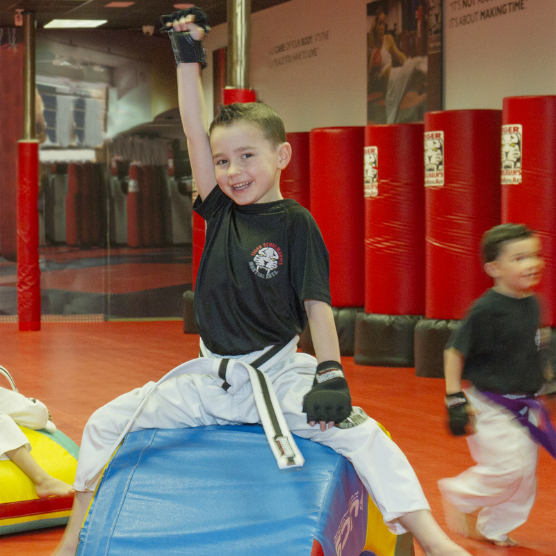 Tiger Schulmann's Martial Arts | Boy Raising Hand