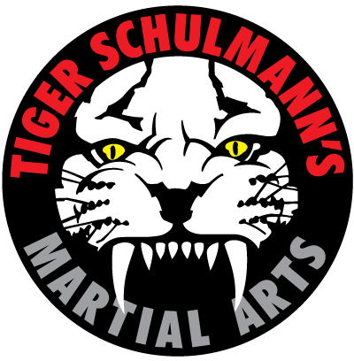 Tiger Schulmann's logo with white tiger head