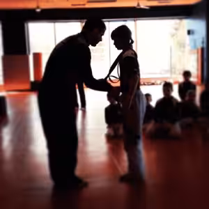 Martial arts instructor training with kids in Abington