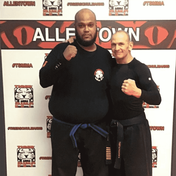 Two martial arts fighters with their fists up in Allentown