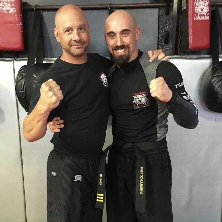Two martial arts instructors at Tiger Schulmann's Colmar