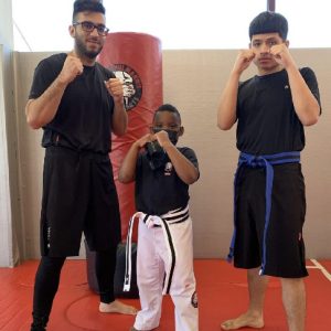 Two boy students and instructor at Tiger Schulmann's Hauppauge