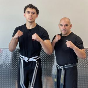 Sensei Jose Montes and a male fighter at Tiger Schulmann's at New Windsor