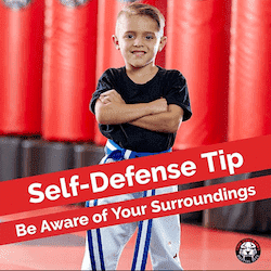 A boy with hands crossed on a self-defense poster