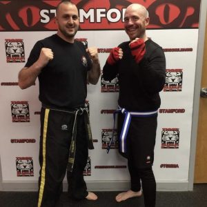 Two martial arts fighters in Tiger Schulmann's Stamford