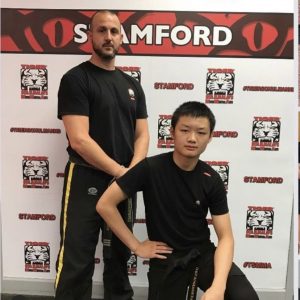 Two martial arts fighters in Tiger Schulmann's Stamford