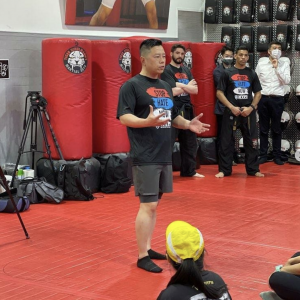 Martial arts expert holding a lecture at Tiger Schulmann's Bayside