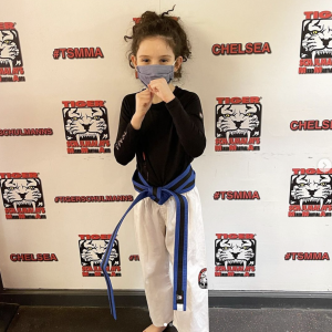 Little girl in a fighting stance at Tiger Schulmann's Chelsea