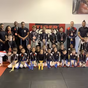 Tiger Schulmann's Rockville adults and kids with their medals