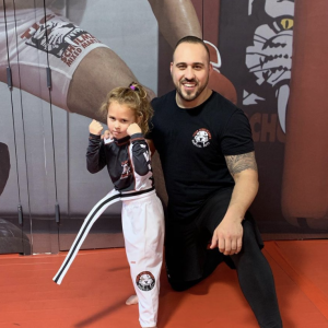 Little girl with martial arts instructor in Seaford