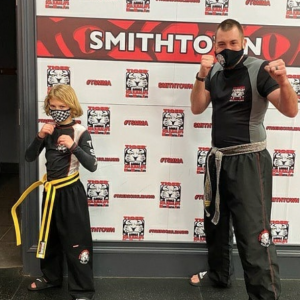 Little girl and Sensei James Leonelli at Tiger Schulmann's Smithtown