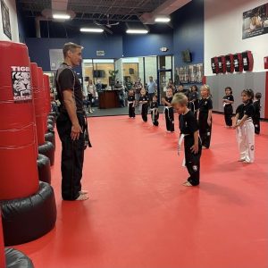 Kids with their martial arts instructor in Wayne