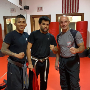 Three martial arts fighters in Tiger Schulmann's Yonkers