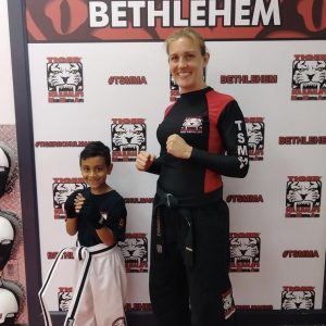 Female instructor and a boy at Tiger Schulmann's in Bethlehem