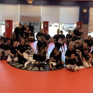 Children and martial arts instructors at Tiger Schulmann's