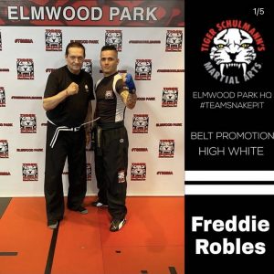 Two martial arts fighters posing at Tiger Schulmann's at Elmwood Park