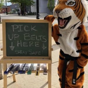A tiger mascot and a chalkboard