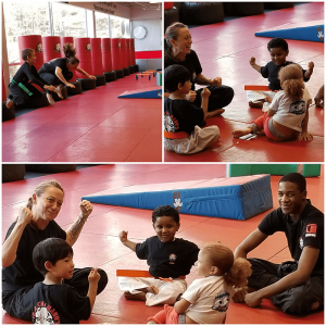 Kids Martial arts workout and their instructors at Tiger Schulmann's in Englewood