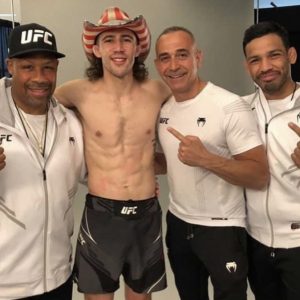 UFC fighter with his Tiger Schulmann's crew