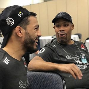 Two UFC fighters sitting and talking