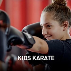 A girl exercising karate