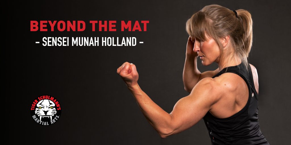 Sensei Munah Holland posing with fists up