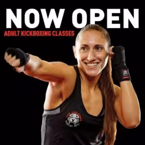 A girl in a kickboxing stance in Bellerose gym