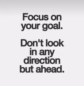 Motivational sign about focusing on your goal and look only ahead
