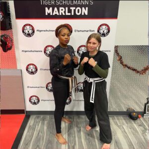 Students posing at Tiger Schulmannn's Marlton