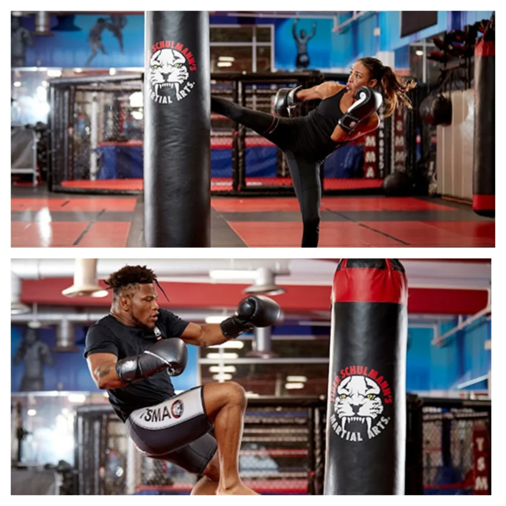 Two Kickboxers Working Out With Punching Bags in Tiger Schulmann's Gym